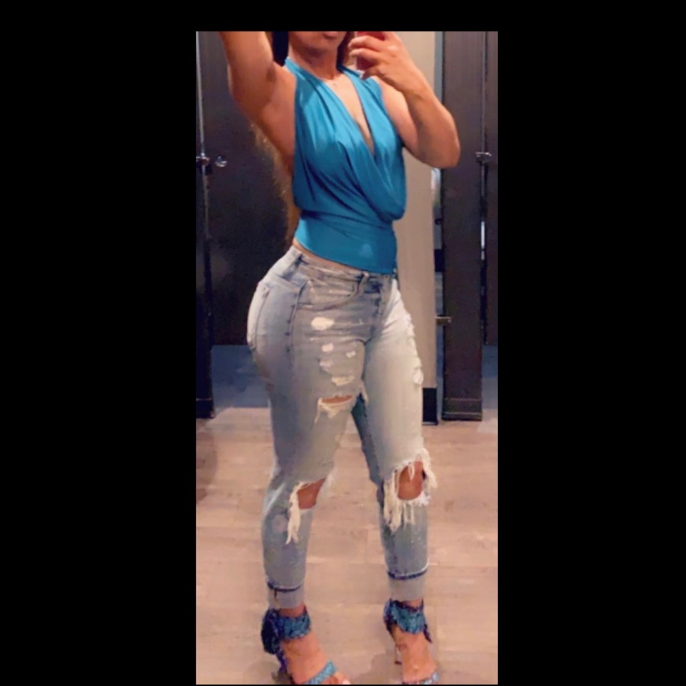 KanCan ripped paint splatter jeans.  Size 24